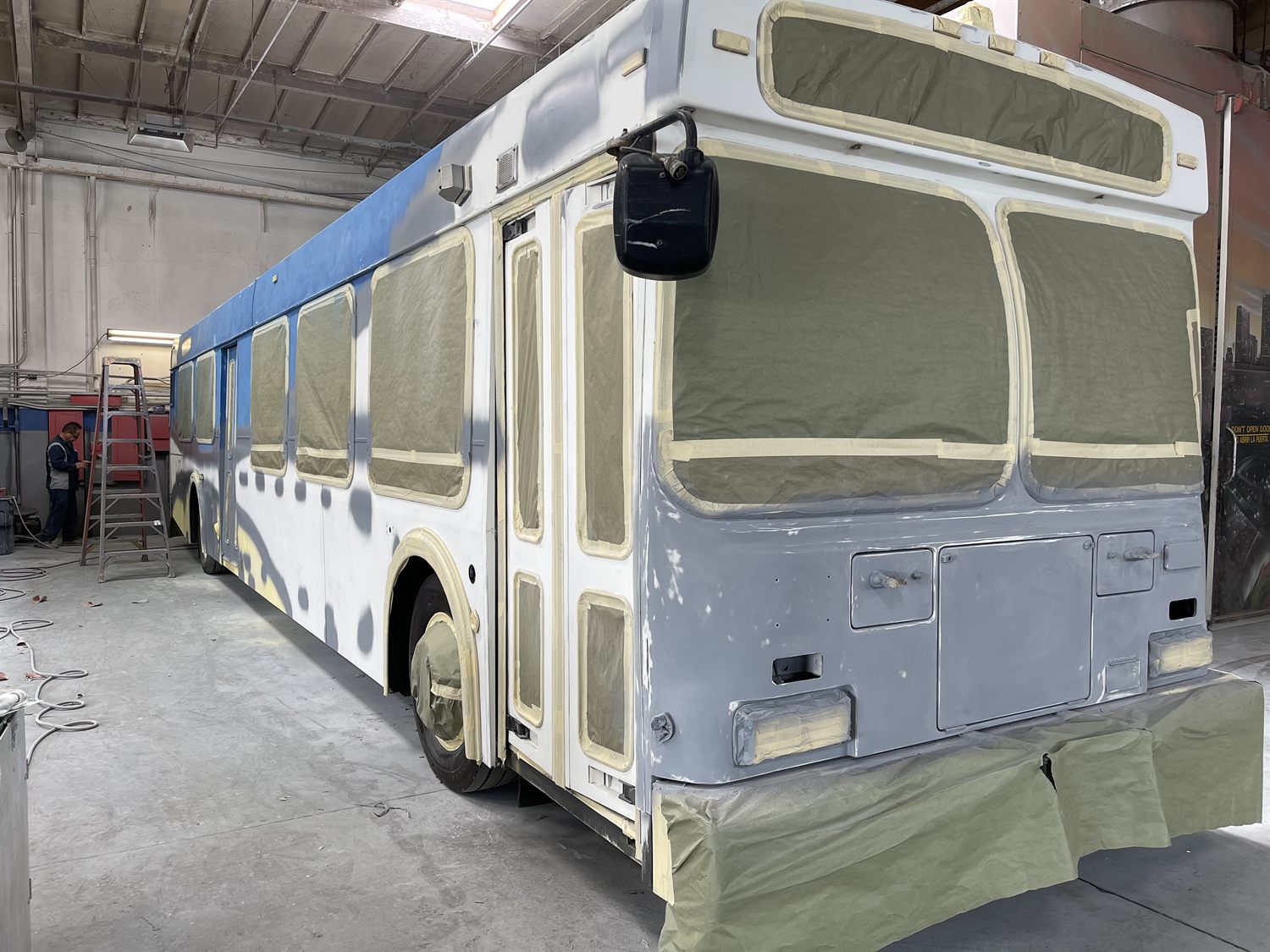 Transit bus in the paint booth